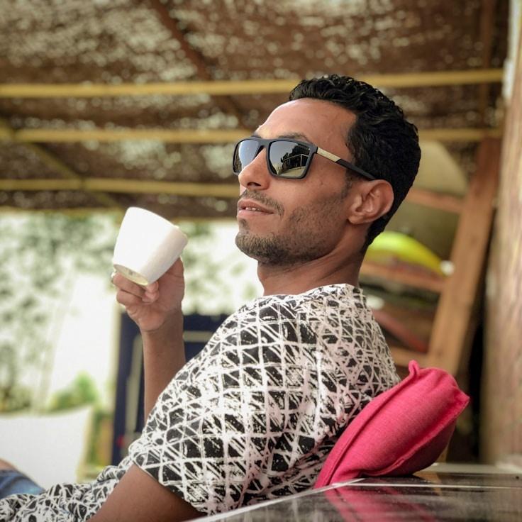 Portrait of Kai Belmont, community mentor and Italian cuisine specialist